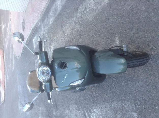 GRAN OPORTUNIDAD, PRECIOSO SCOOTER TGB BELLAVITA 125i DEL AÑO 2014 CON TAN SOLO 4800 KM. EXTRAS BAÚL Y ANTIRROBO.